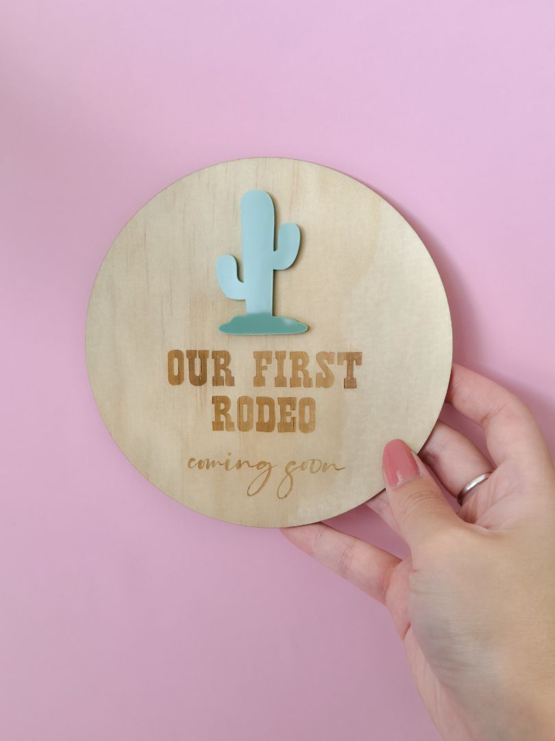 AXN Laser Creations Pregnancy Reveal and Announcement Plywood Plaque - Our First Rodeo