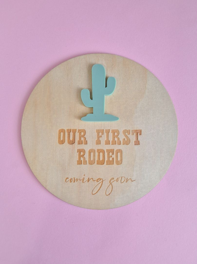 AXN Laser Creations Pregnancy Reveal and Announcement Plywood Plaque - Our First Rodeo