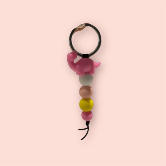 Sweet.Sunshine229 Silicone beaded keychain,  Pink Dinosaur